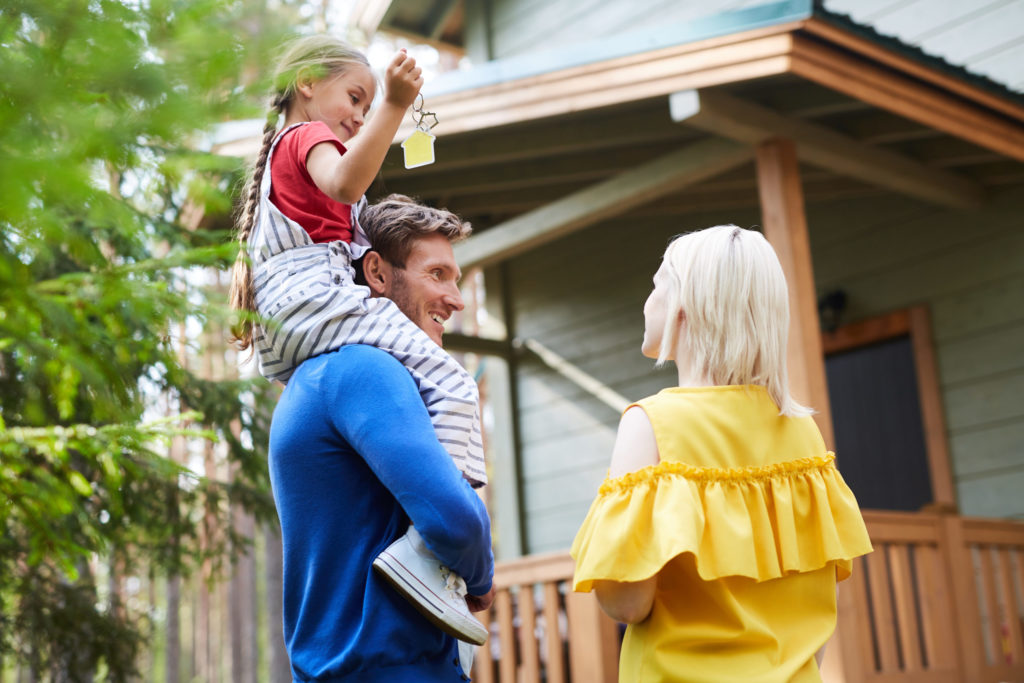 Happy Family With A new House